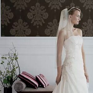 Taffeta, draped, a-line wedding gown. David’s Bridal, style T9579, size …